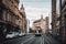 lofitown street, with vintage cars and trams passing by