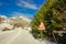 LOFOTEN, NORWAY, APRIL, 10, 2018: Outdoor view of frozen street with an informative sign in Skjelfjord in Lofoten