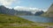 Lofoten, Reine tilt shot of Nordic Fjords and the blue lake.