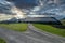 Lofotr long house, a home for vikings in the viking era, during sunset and dramatic skies.