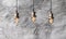 Loft pendant lamps on the background of rough cement plaster.