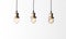 Loft pendant lamps with edison light bulbs.