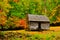 Log cabin in fall colors