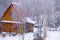 Log cabin in snowy forest