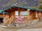 A log cabin at the summit of the top of the world highway