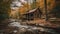 Log cabin in the woods with a stream. Serene cozy lodge home in autumn forest with river.