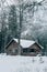 Log Cabin in the Woods in Winter