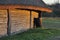 Log house with thatched roof