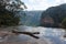 A log in the water at the top of the Wentworth Falls in the Blue Mountains in Australia