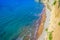 Loggas beach at Peroulades is a paradise beach at  high rocky white cliff and crystal clear azure water in Corfu, close to Cape