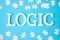 LOGIC text with white puzzle jigsaw pieces on blue background. Concepts of logical thinking, Conundrum, solutions, rational,