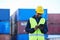 Logistics, digital tablet and black man in supply chain management at shipping, cargo or freight warehouse. Industrial