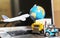 Logistics and supply chain management for online shopping concept: globe, white yellow truck, airplane, forklift on a laptop