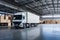 Logistics and transportation. White truck in the warehouse with boxes. for advertising