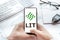 Logo of Litentry coin in tablet. Cryptocurrency LIT token. Trading blockchain platform to buy,sell on decentralized exchange DEX,