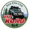 Logo Off Road color. An all-terrain vehicle rides on stones