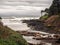 Logs clog a small inlet on a rugged coast