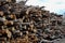 Logs stacked on logging and woodworking industry. A stock pile of timber, chopped down trees. Timber industry.