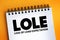 LOLE - Loss of Load Expectation acronym text on notepad, abbreviation concept background