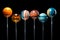 Lollipop candies as planets of solar system. Astronomy themed sugar sweets. Colorful lollipops in shape of planets. Imagination,