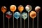 Lollipop candies as planets of solar system. Astronomy themed sugar sweets. Colorful lollipops in shape of planets. Imagination,
