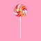 Lollipop on a pink background. Red and white candy