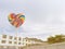 Lollipop rainbow with building background concept LGBT community