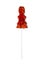 Lollipop on a stick in the form of a bunny on a white background.Lollipop on a stick of burnt sugar.