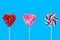 Lollipops on a blue background. Isolate.