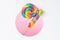 Lollipops candy colorful rainbow in a layered paper design with circle cut hole pink background