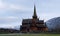 Lom Stavkirke stave church in autumn in Norway