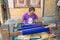 LOMBOK, INDONESIA - DECEMBER 30, 2016: Woman weaving on a loom