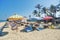 LOMBOK  INDONESIA - OCT 23  2020: Bean bags and Parasols for beach visitors and guests in front of Aston Sunset Beach Resort  Gili