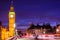 London Big Ben and westminster street crowd and traffic night life. Long exposure of speed motion people walking and