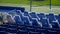 London, Britain-September, 2019: View of empty blue stands in front rows. Action. First seats in stands for VIP persons