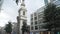 London, Britain-September, 2019: View of old clock tower in center of modern city with walking people. Action. European