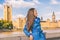 London city lifestyle Asian businesswoman Europe autumn travel in blue trench coat. Multiracial model posing in fashion