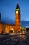 London cityscape with Elizabeth Tower or Big Ben and Doubledecker bus moves along the Westminster Bridge