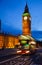 London cityscape with Elizabeth Tower or Big Ben and Doubledecker bus moves along the Westminster Bridge