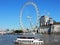 London cityscape, Eye and County Hall building seen from river Thames