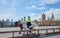 London, England - 08/21/2019: Two policemen ride on horseback across London`s Westminster Bridge, overlooking the Parliament and