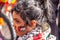 LONDON, ENGLAND- 15 May 2021: Little girl with a Palestinian flag painted on her face at a March For Palestine demonstration in