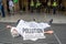 LONDON, ENGLAND- 24 August 2021: Extinction Rebellion playing dead in protest of climate change outside London Bridge Station