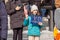 LONDON, ENGLAND- 6 March 2022: Little girl holding a SLAVA UKRAINI placard at a Rally for Ukraine