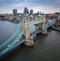 London, England - Aerial panormaic view of the iconic Tower Bridge and Tower of London on a cloudy moring