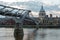 London, England - June 17 2016: Twilight panorama of Millennium Bridge and St. Paul Cathedral, London