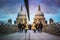 London, England - Londoners walking through Millennium Bridge. Reflecting St.Paul`s Cathedral