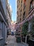 London, England, November 25, 2022: Picturesque Lovat Lane, and the square is a walk, with various buildings and premises