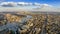 London, England - Panoramic aerial view of London with the famous Tower and Tower Bridge and skyscrapesr of Canary Wharf