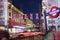 London, England, United Kingdom: 16 June 2017 - Popular tourist Picadilly circus with flags union jack in night lights illuminatio